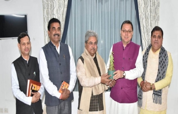 BJP in-charge met CM Dhami