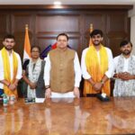 CM Dhami meets DUSU President and JNUSU Joint Secretary