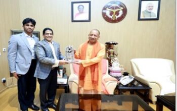 Sify Chairman Raju Vegesanane meets CM Yogi