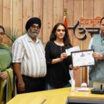 CM Dhami honored meritorious students