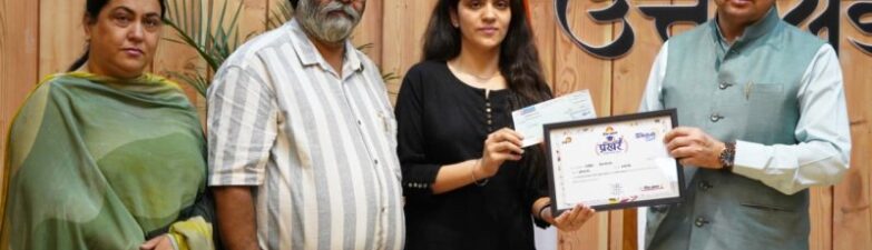 CM Dhami honored meritorious students