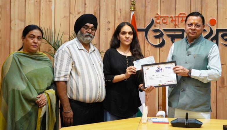 CM Dhami honored meritorious students