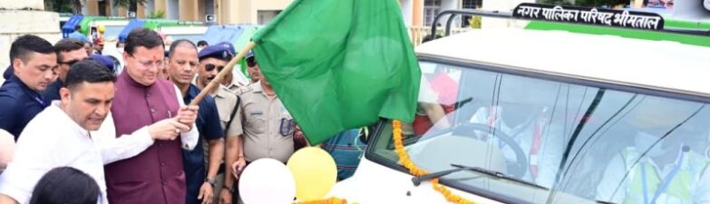 CM Dhami flags off five new garbage vehicles